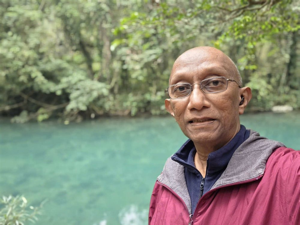 Farook Maricar, by a river in Vietnam