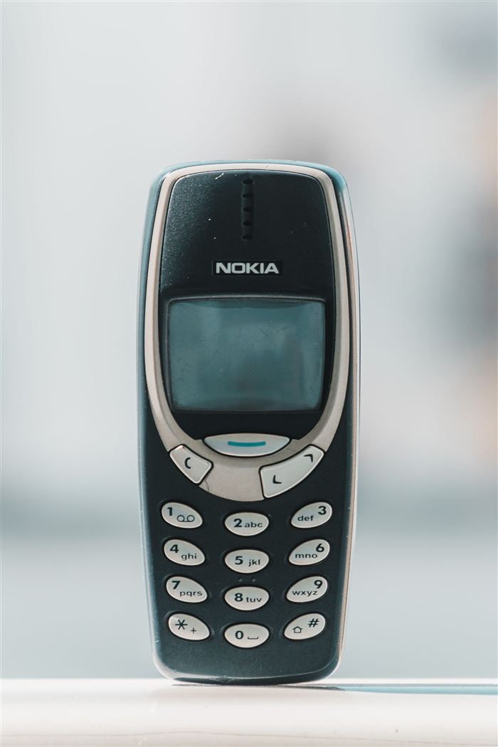 Classic Nokia 3310 phone from the late 1990s — the grey brick that started it all